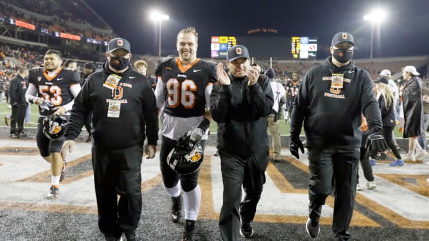 Nov 20, 2021; Corvallis, Oregon, USA; Oregon State Beavers head coach Jonathan Smith celebrates after a 24-10 win over Arizona State Sun Devils at Reser Stadium. Mandatory Credit: Soobum Im-USA TODAY Sports